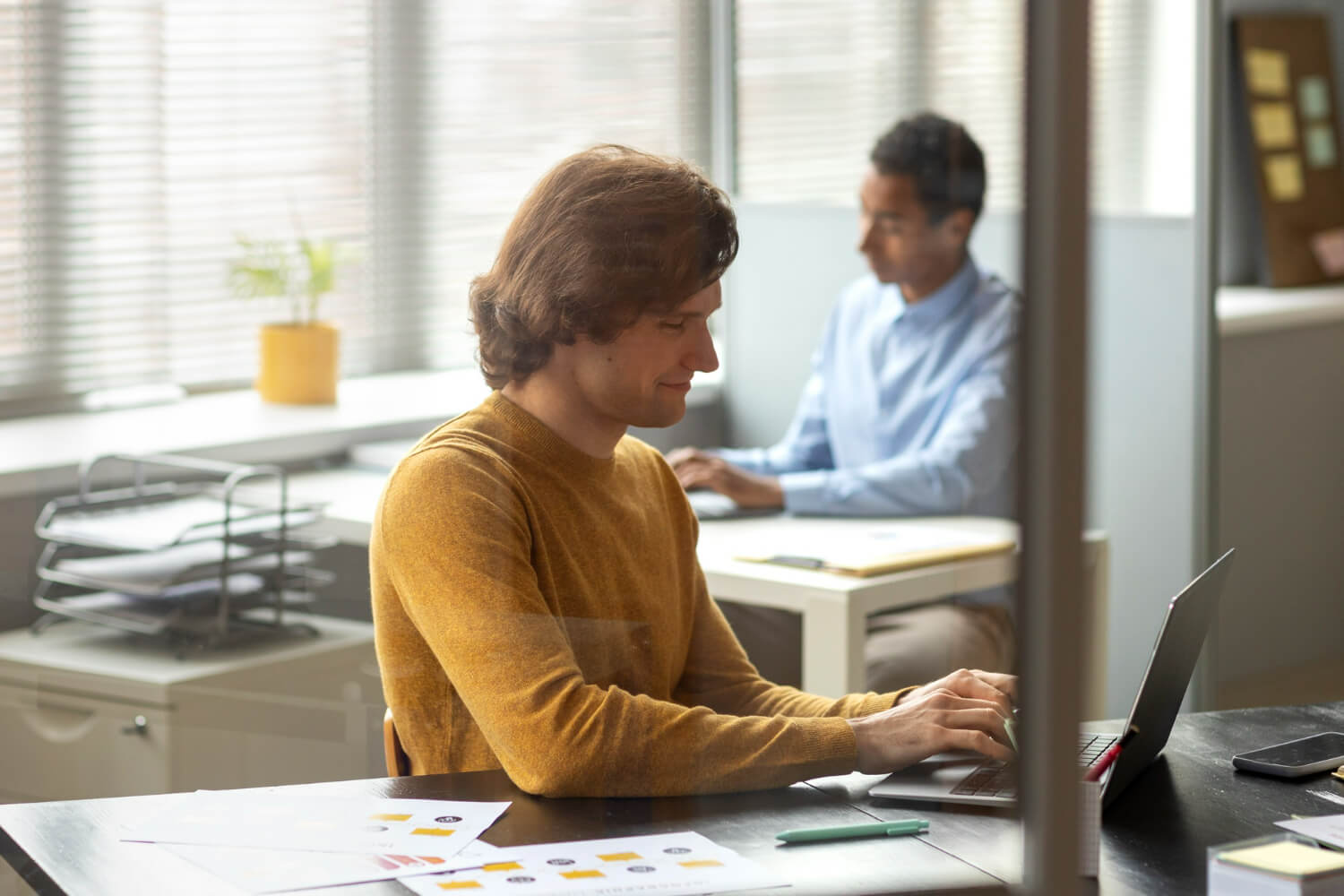 Man using artificial intelligence on his laptop for work